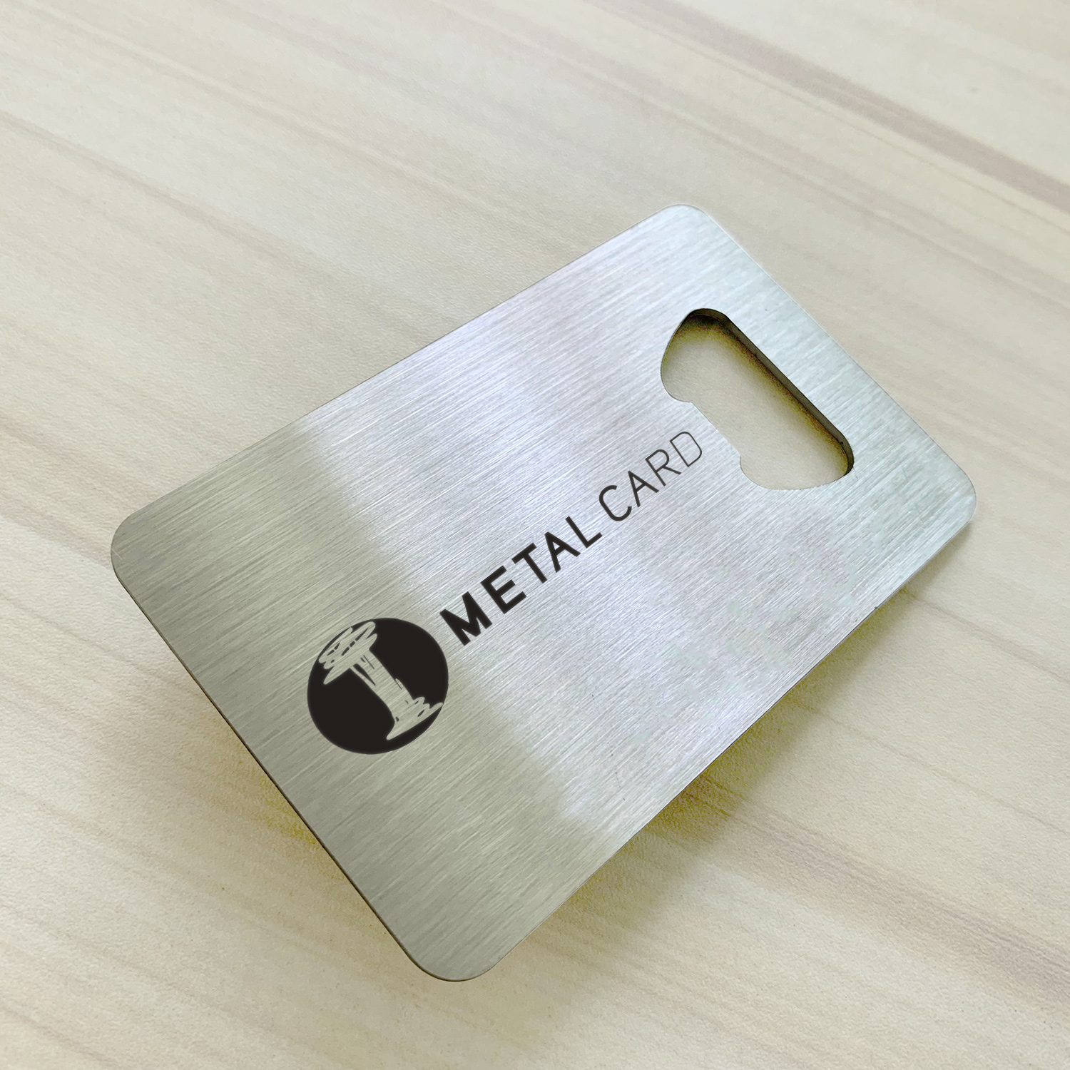 Metal business card bottle opener